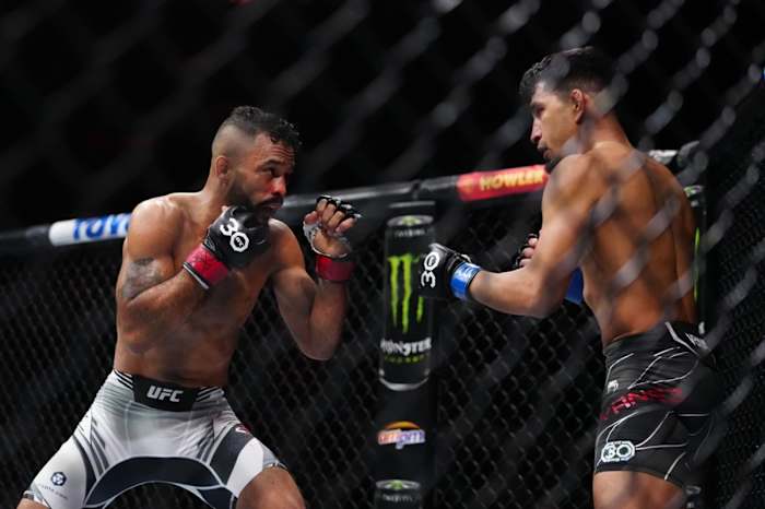 Rob Font fights Adrian Yanez.